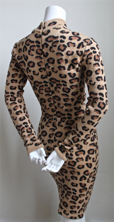 Very rare leopard knit dress with high V neckline from Azzedine Alaia dating to Autumn/Winter 1991-1992. Dress is labeled a size 'S', which can easily accommodate a medium as well. Made in Italy. Good/Very good condition (several rewoven areas which