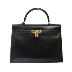 HERMES KELLY 35 cm black box leather rigid bag / gold hardware