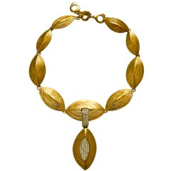 YVES SAINT LAURENT oversized gilt necklace with crystals