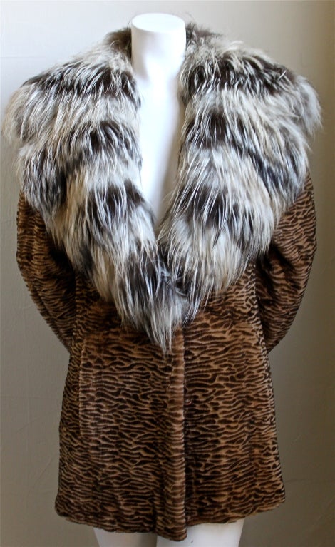 Unique carved mink jacket with cross fox fur trim from Sorbara for Neiman Marcus dating to 2011. Labeled a Size 6. Fully lined. Excellent condition/ never worn.