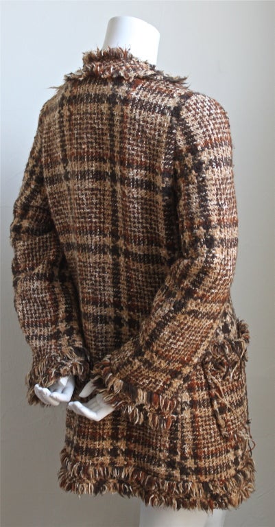 Brown tweed coat with raw edges from Junya Watanabe as seen on the runway Fall 2003. Size M.  Approximate measurements are as follows: bust 38