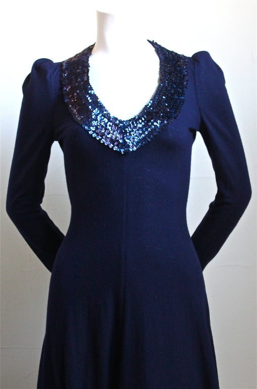 Very rare inky blue-purple wool knit dress with sequined trim from Biba dating to the 1970's. Fits a US 4-6. Zips up center back. Made in the U.K. Very good condition.