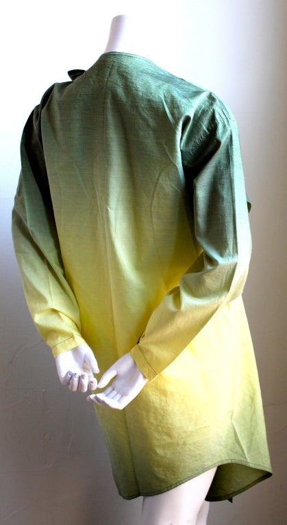 Vivid ombre dyed dress from Issey Miyake dating to the 1980's, Can also be worn as a jacket. Fits a small or medium. Approximate measurements are as follows:
bust 38