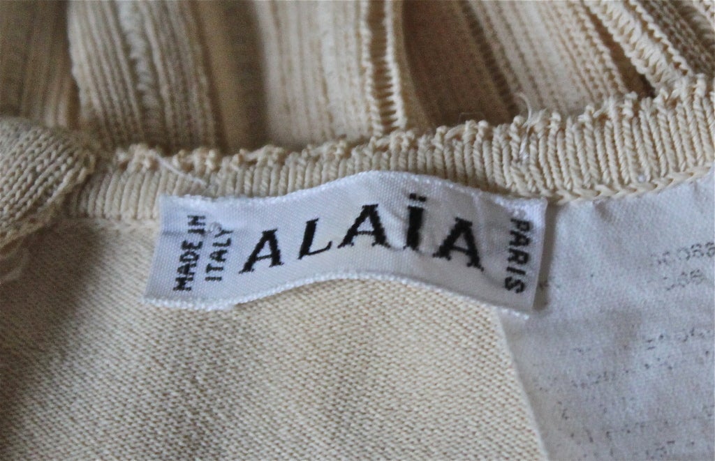 AZZEDINE ALAIA cream mini dress with ruffled hemline In Excellent Condition In San Fransisco, CA