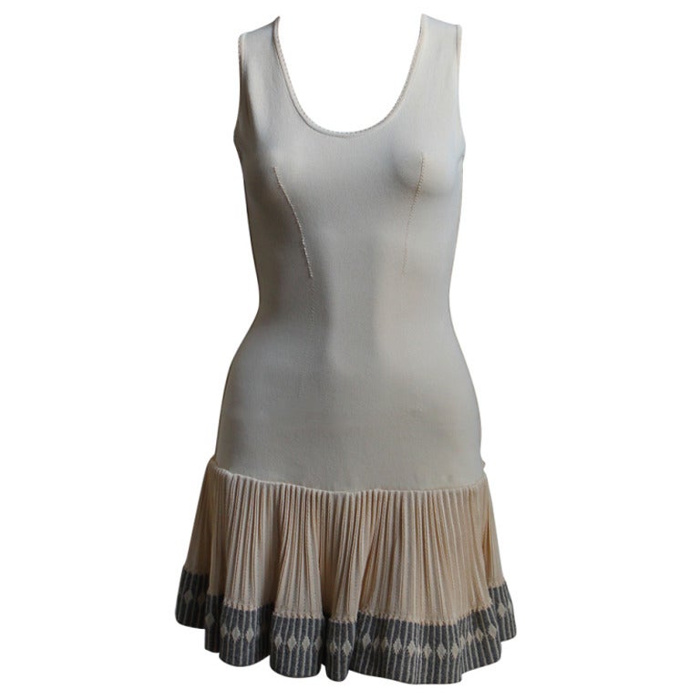 AZZEDINE ALAIA cream mini dress with ruffled hemline