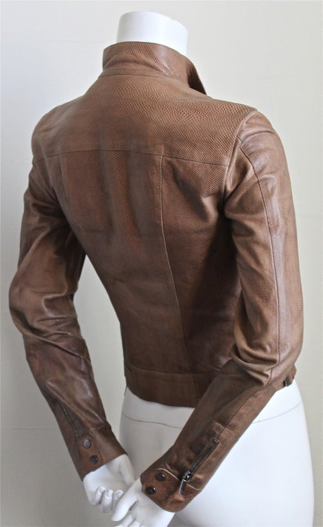 Brown karung lizard leather jacket designed by Tom Ford for Gucci dating to 1999. As seen on the runway. Labeled an Italian size 38, which best fits a US 2. Made in Italy. Good condition (darkening to leather). Was $895, Now $375.