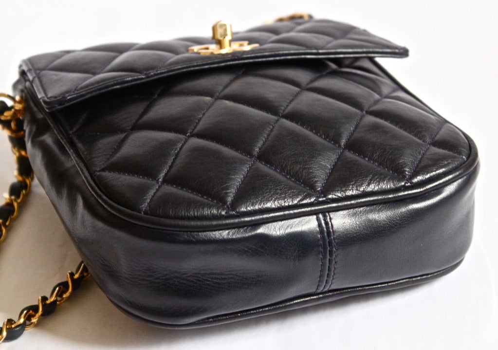 1980's CHANEL navy blue quilted leather satchel bag with CC turnlock