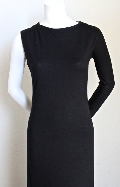 Jet black asymmetrical cut wool jersey dress from Helmut Lang dating to the 1990's. Labeled an Italian size 40 although this would best fit a US size 2 or 4 (not clipped on size 2 mannequin). Approximate measurements: shoulder 14