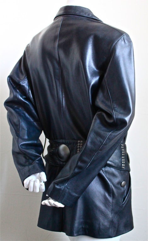 Butter soft black sheepskin leather jacket with pewter-toned studs from Issey Miyake dating to the early 1980's. Labeled a size M. Approximate measurements: bust 38-40