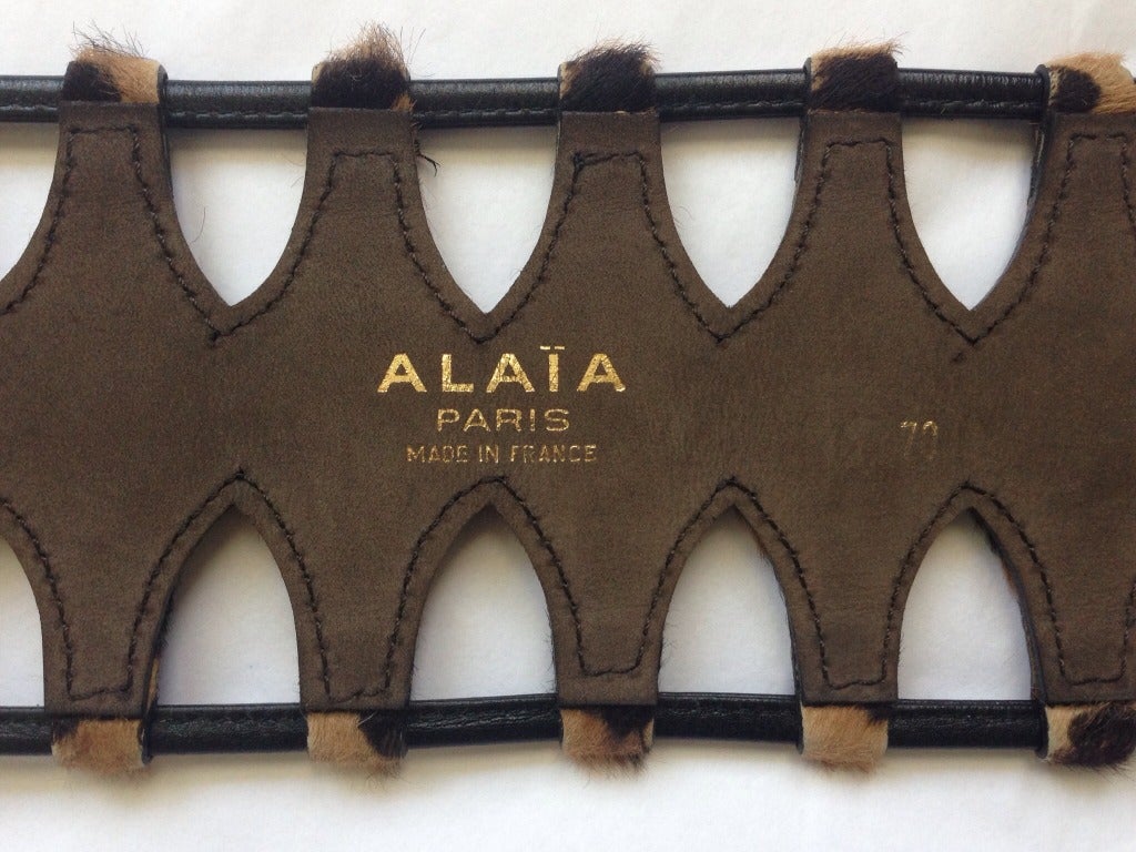 Very rare leopard printed pony fur cage belt from Azzedine Alaia dating to 1991. Labeled a French size 70. Belt measures just under 4