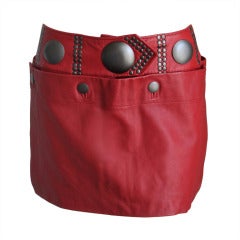 1980's ISSEY MIYAKE red leather mini skirt with oversized studs