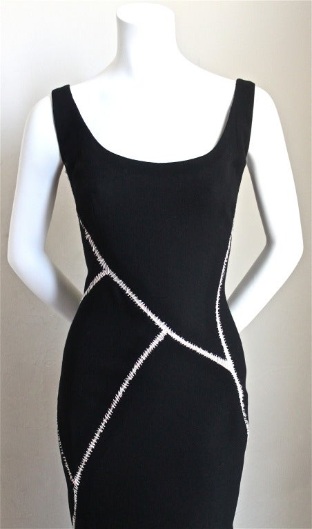 Jet black wool crepe dress with white stitched detail from Alexander McQueen circa 2008. Italian size 42. Measures approximately: 34