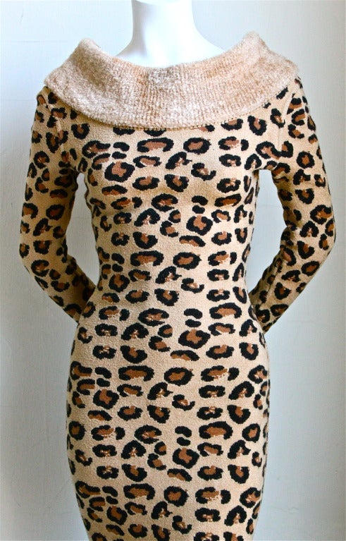 Extremely rare woven leopard knit dress with chenille neckline and zippered hem from Azzedine Alaia dating to fall of 1991. Labeled a size XS. Approximate un-stretched measurements: bust 30