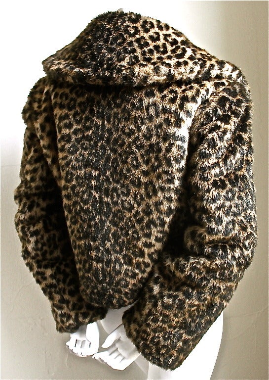 Very rare faux fur bolero jacket with black woven frog closure by Azzedine Alaia dating to the Autumn/Winter collection of 1991-1992. Fits a size small or medium. Approximate measurements: Laying flat on the outside, the jacket measures about 20