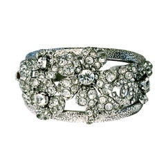 CHANEL floral cuff bracelet with 'CC' and crystals 9