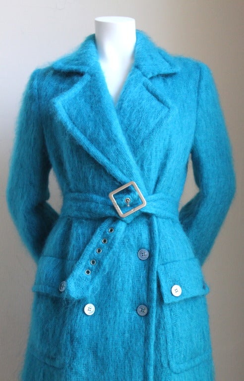Extremely rare turquoise mohair trench style coat designed by Tom Ford for his very first collection for Gucci fall 1995. Can be seen on looks 1 and 2 of the runway and was featured on Amber Valetta in Gucci's fall 1995 ad campaign.  