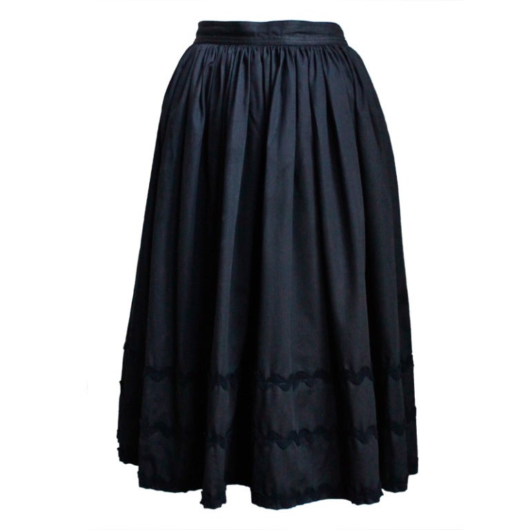1970's YVES SAINT LAURENT black skirt with ric rak trim