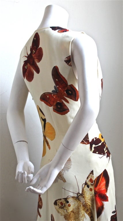 Beautiful off white silk gown with printed butterflies from Alexander McQueen dating to 2007. Labeled an Italian size 44. Made in Italy. Very good condition.