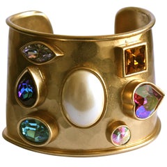 1980's YVES SAINT LAURENT heavy hammered gilt cuff with colorful faceted stones