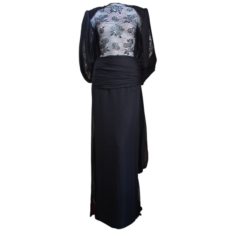 JAMES GALANOS black silk gown with sheer lace panels and long waist ties