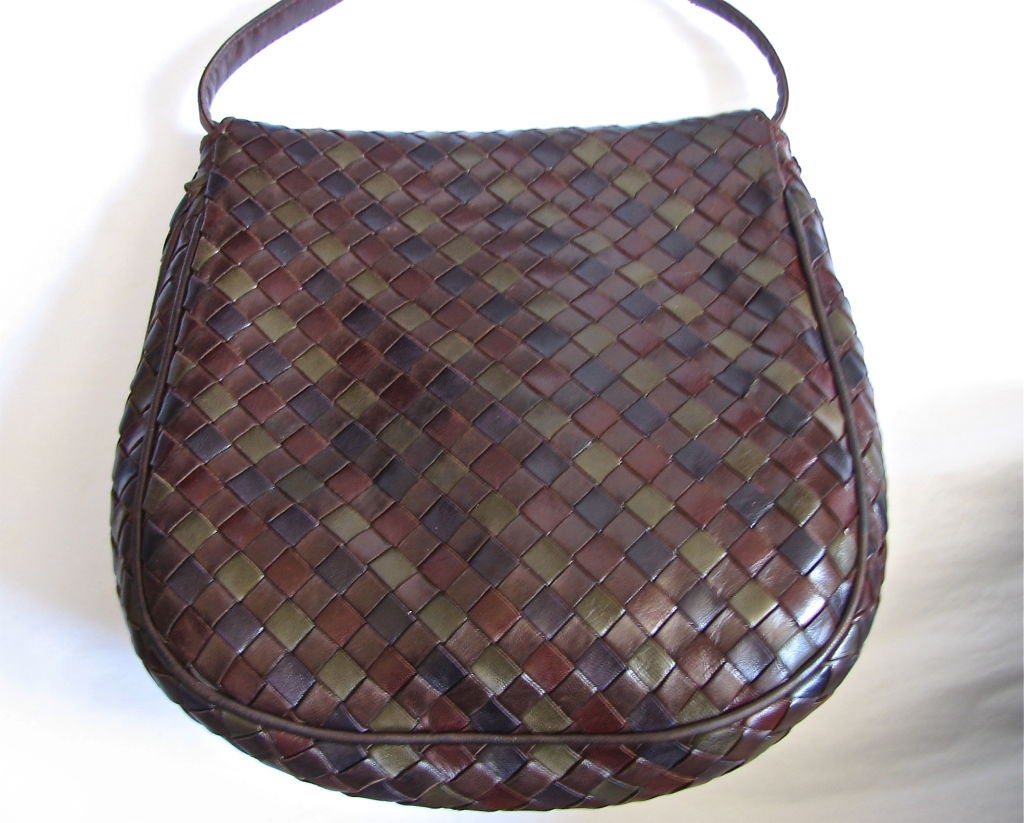 burgundy woven leather bag