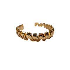 Vintage YVES SAINT LAURENT gilt 'ribbon' cuff