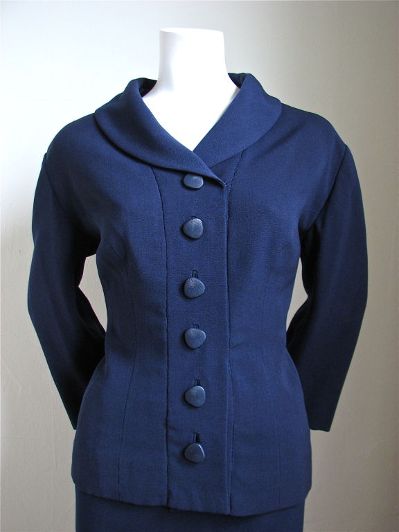 Impeccably made couture suit from Cristobal Balenciaga, circa 1960. Navy blue gabardine. Side zip pencil skirt with a flat waistband and closely tailored fit. Best suited for a US size 6-10. Bust 38