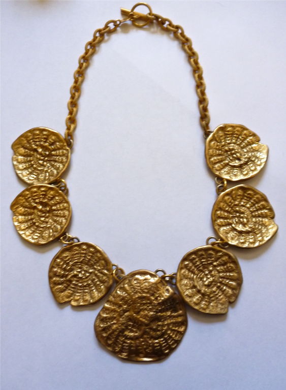 Very dramatic and very rare gilt metal necklace with shell motif from Charles Jourdan dating to the 1980's. 20