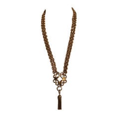 Vintage YVES SAINT LAURENT extra long gilt necklace with tassel