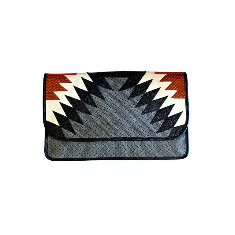 CARLOS FALCHI clutch with snakeskin trim