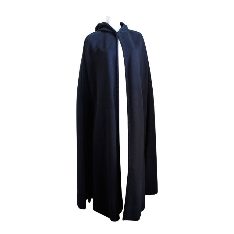CHRISTIAN DIOR black hooded cape with tassel and braided trim
