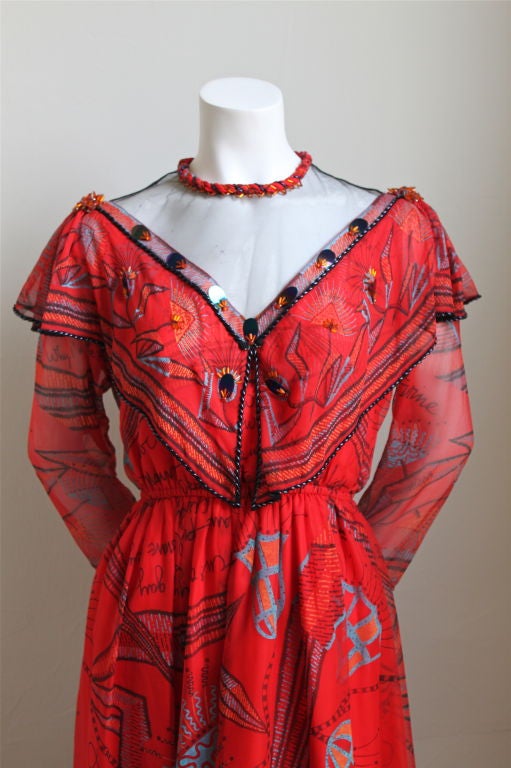 very rare red beaded and sequined silk gown with hand painting from Zandra Rhodes dating to the 1980's. UK size 10, however best suited for a US 2-6. Bodice and skirt are fully lined. Made in England. Excellent condition.