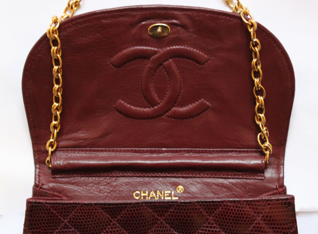 CHANEL burgundy quilted lizard skin convertible clutch 1