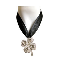 YVES SAINT LAURENT rhinestone clover with faceted glass