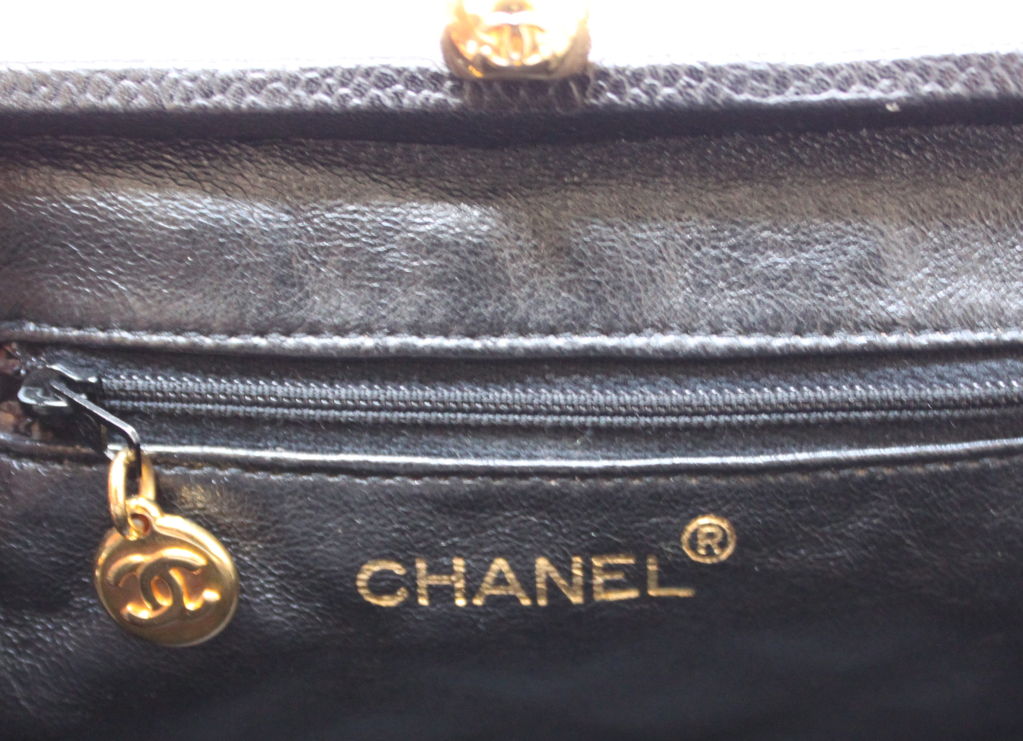 CHANEL quited frame bag in black caviar leather with gilt chain 3