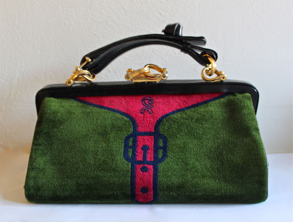 Vibrant velvet doctor bag with leather trim and gilt hardware from Roberta di Camerino dating to the 1960's. Very unique black leather handle. Colors are a rich grass-green, fuschia, navy blue and black. Bag measures 13