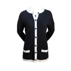 classic CHANEL jet black cashmere twinset with white trim