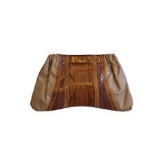 CARLOS FALCHI tan leather and reptile shaped clutch