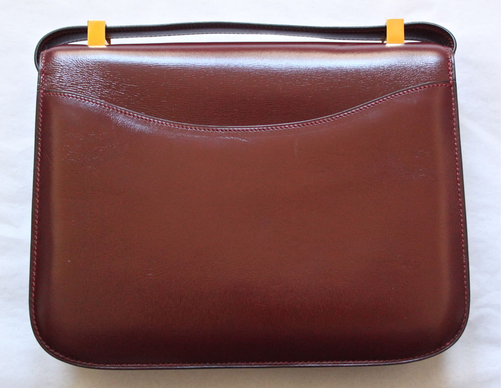 Women's 1974 HERMES burgundy 23 cm CONSTANCE with gold hardware