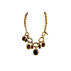 YVES SAINT LAURENT numbered gilt necklace with glass cabochons