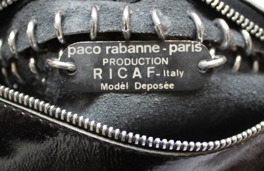 Women's PACO RABANNE black leather bracelet clutch with aluminum discs
