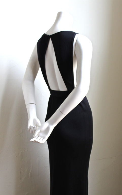 Women's 1980's YVES SAINT LAURENT fitted black dress with open back