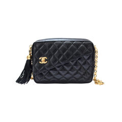 CHANEL black leather flap bag with turn lock