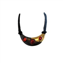 YVES SAINT LAURENT modernist necklace on silk cord