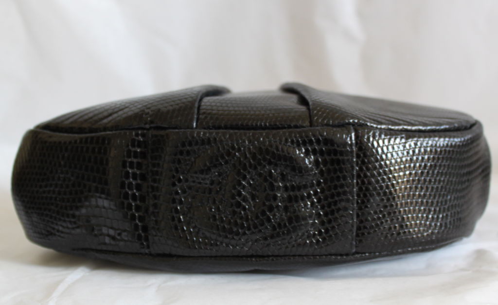CHANEL black lizard evening bag with gilt chain