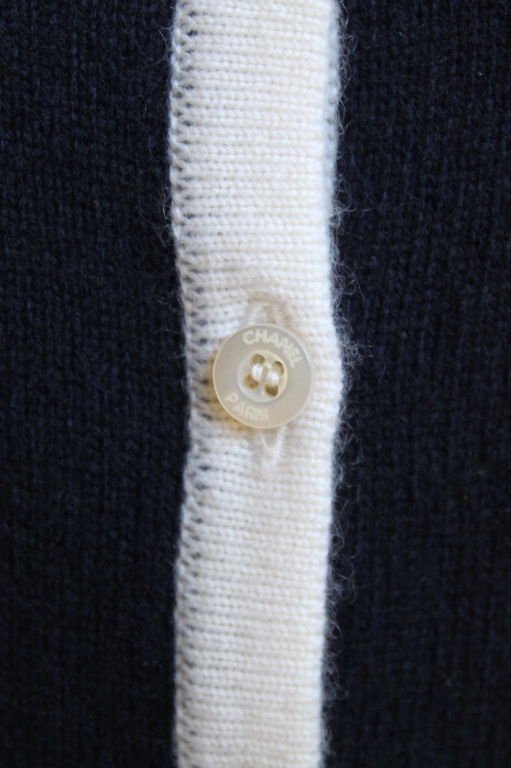 CHANEL navy blue cashmere cardigan with white trim