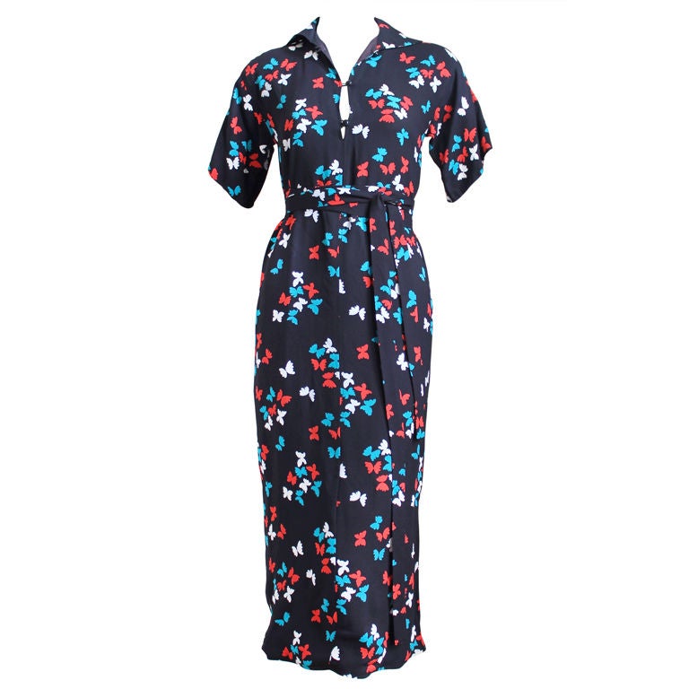 YVES SAINT LAURENT butterfly print dress with long belt.