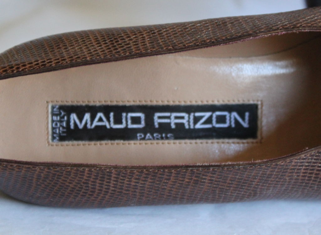 Classic brown karung lizard heels from Maud Frizon dating to the 1980's. Fabulous shape which is cut high on the foot, almost resembling very low cut booties. Size 6.5. Wood heel. Made in Italy. Excellent condition.