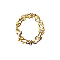 YVES SAINT LAURENT long gilt 'Y S L' necklace