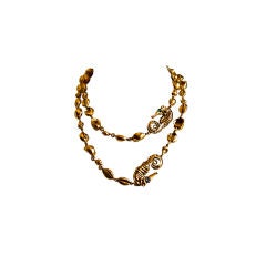 Vintage YVES SAINT LAURENT x-long gilt necklace with seahorses & shells